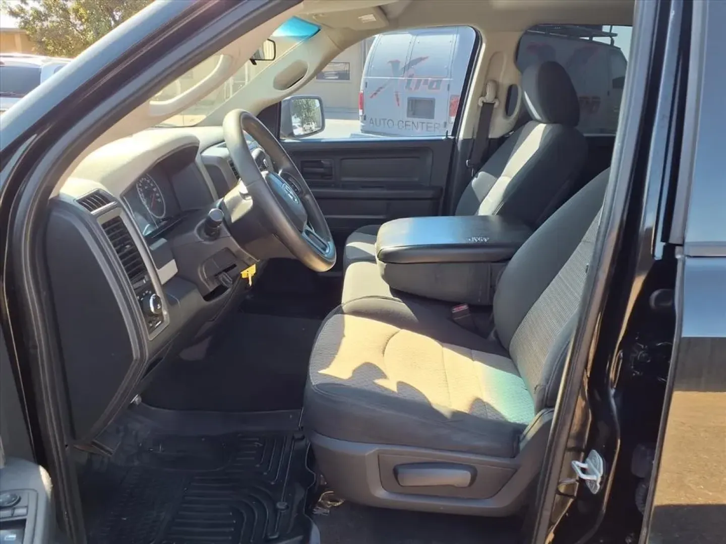 2012 Black Clear Coat Ram 1500 ST Quad Cab 2WD (1C6RD6FT5CS) with an Other engine, located at 1401 N. Hobart, Pampa, TX, 79065, (806) 665-9872, 35.549953, -100.975098 - Are you ready to elevate your adventures and take on life's challenges with confidence? Whether you're commuting to work, heading out for a weekend getaway, or tackling a DIY project, the 2012 Dodge Ram 1500 is the perfect companion for your active lifestyle. With a robust 5.7L V8 engine and rear-wh - Photo#9