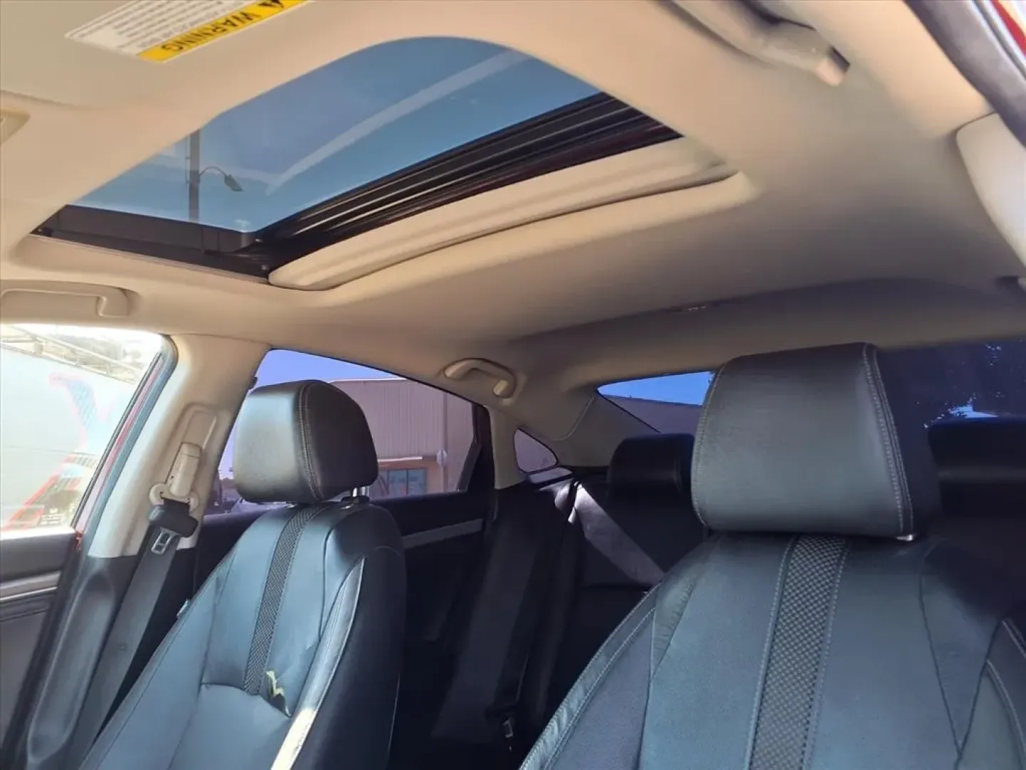 2019 Honda CIVIC TOURING (JHMFC1F9XKX) with an 1.5L engine, CVT transmission, located at 1401 N. Hobart, Pampa, TX, 79065, (806) 665-9872, 35.549953, -100.975098 - **Discover Adventure with the 2019 Honda Civic Touring Sedan at Xtra Auto Center in Pampa, TX!**<br /> <br /> Are you searching for a reliable and stylish vehicle that can seamlessly adapt to your lifestyle? Look no further than the 2019 Honda Civic Touring Sedan, available now at Xtra Auto Center i - Photo#5