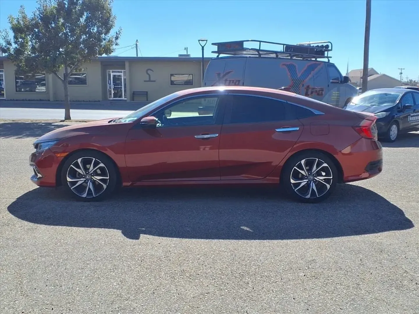 2019 Honda Civic Touring Sedan CVT (JHMFC1F9XKX) with an Other engine, CVT transmission, located at 1401 N. Hobart, Pampa, TX, 79065, (806) 665-9872, 35.549953, -100.975098 - **Discover Adventure with the 2019 Honda Civic Touring Sedan at Xtra Auto Center in Pampa, TX!**<br /> <br /> Are you searching for a reliable and stylish vehicle that can seamlessly adapt to your lifestyle? Look no further than the 2019 Honda Civic Touring Sedan, available now at Xtra Auto Center i - Photo#4