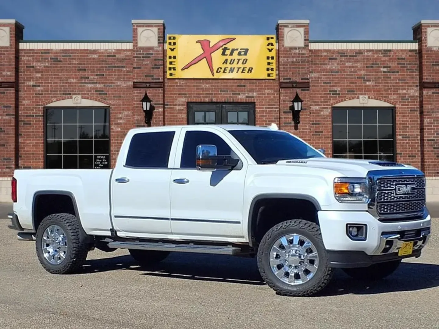 2018 GMC Sierra 2500HD Denali Crew Cab 4WD (1GT12UEYXJF) with an Other engine, Automatic transmission, located at 1401 N. Hobart, Pampa, TX, 79065, (806) 665-9872, 35.549953, -100.975098 - Elevate your lifestyle with the perfect blend of power, comfort, and versatility with this stunning 2018 GMC Sierra 2500HD Denali Crew Cab 4WD, available now at Xtra Auto Center, your trusted Buy Here Pay Here dealership in Pampa, TX. This rugged yet refined truck is designed to meet the needs of bo - Photo#0