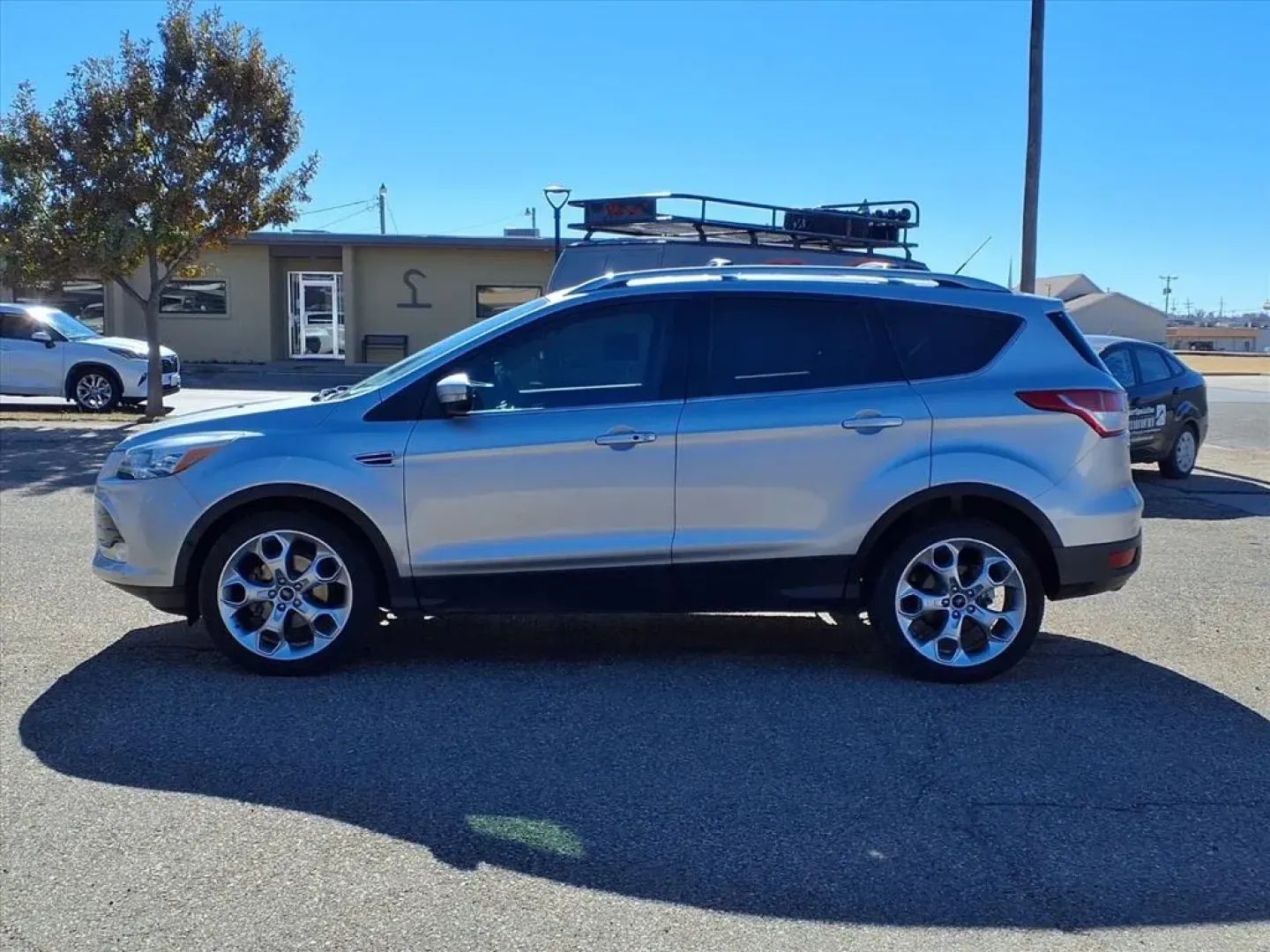 2015 Ford Escape TITANIUM (1FMCU0JXXFU) with an 1.6L engine, Automatic transmission, located at 1401 N. Hobart, Pampa, TX, 79065, (806) 665-9872, 35.549953, -100.975098 - **Explore New Adventures with the 2015 Ford Escape Titanium FWD from Xtra Auto Center!**<br /> <br /> Are you in search of a reliable, stylish, and versatile vehicle to enhance your daily commute or weekend getaways? Look no further than the 2015 Ford Escape Titanium FWD, now available at Xtra Auto - Photo#4
