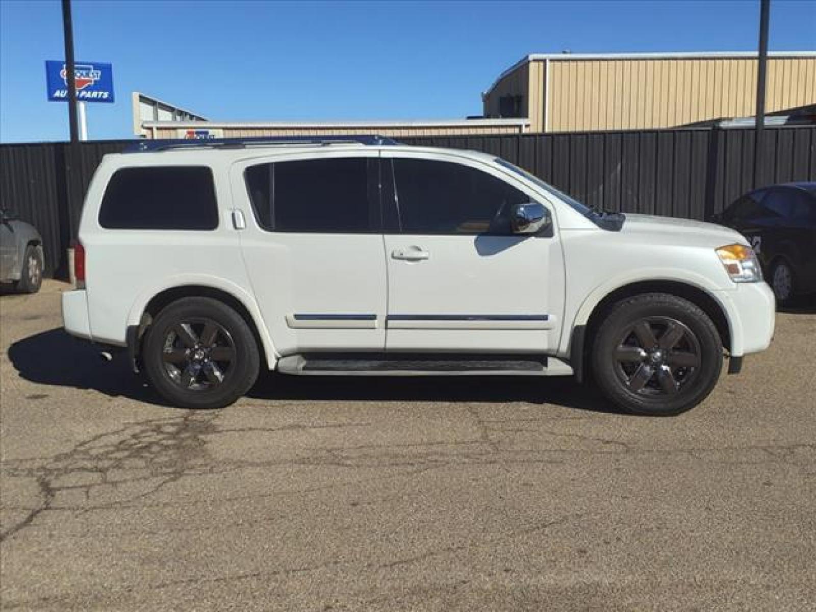 2013 Pearl White Nissan Armada Platinum (5N1BA0NEXDN) with an 5.6L 5.6L Flex Fuel V8 317hp 3 Fuel Injected engine, 5-Speed Automatic transmission, located at 1401 N. Hobart, Pampa, TX, 79065, (806) 665-9872, 35.549641, -100.971878 - Photo #2