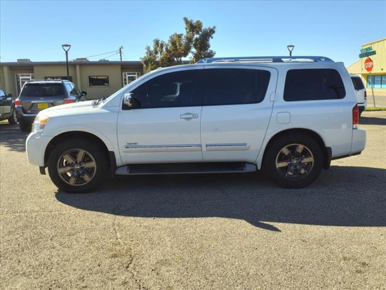 2013 Pearl White Nissan Armada Platinum (5N1BA0NEXDN) with an 5.6L 5.6L Flex Fuel V8 317hp 3 Fuel Injected engine, 5-Speed Automatic transmission, located at 1401 N. Hobart, Pampa, TX, 79065, (806) 665-9872, 35.549641, -100.971878 - Photo #4