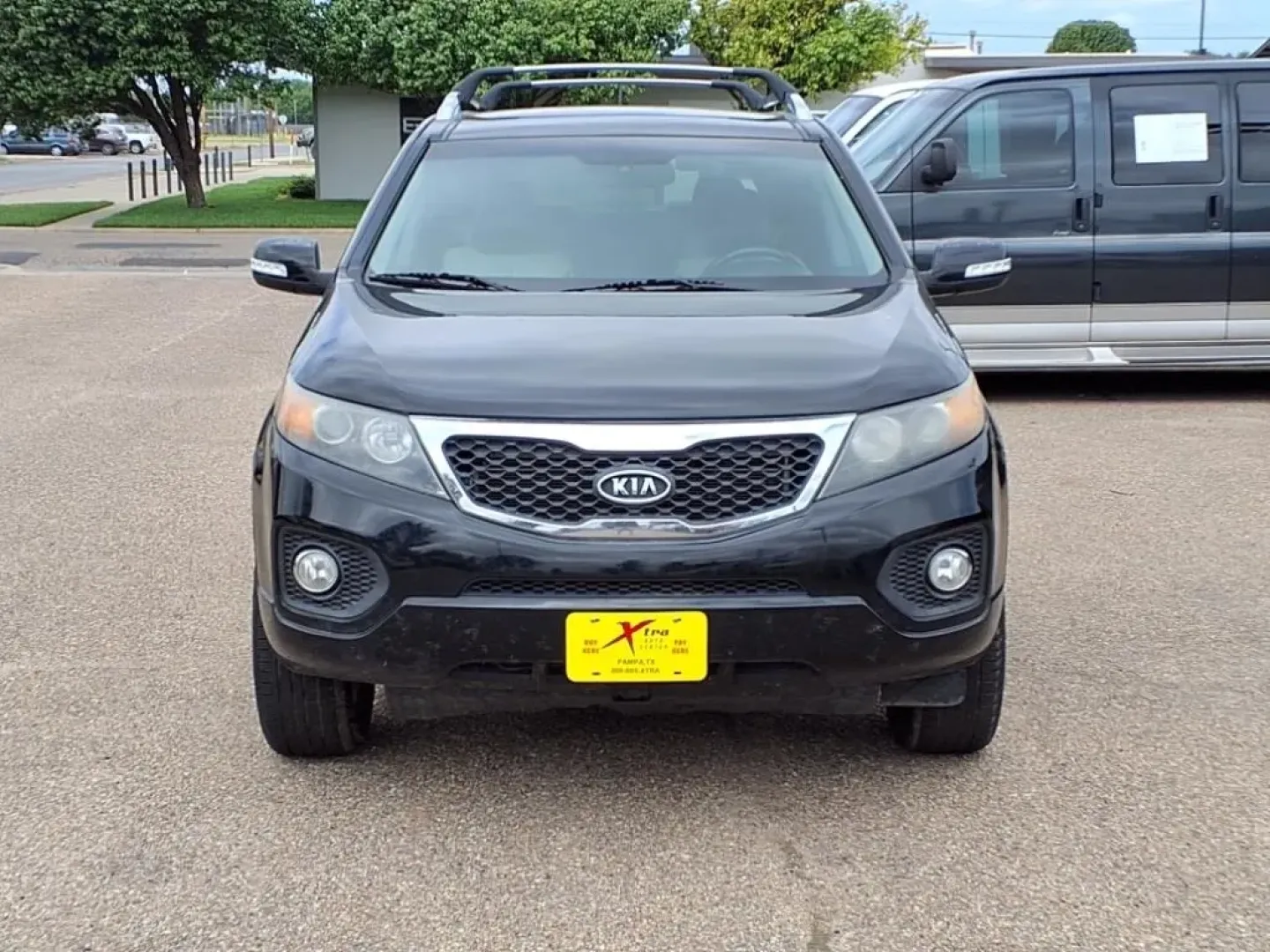 2013 Ebony Black Kia Sorento SX 2WD (5XYKW4A21DG) with an Other engine, located at 1401 N. Hobart, Pampa, TX, 79065, (806) 665-9872, 35.549953, -100.975098 - If you're seeking the perfect vehicle for weekend adventures or family outings, look no further than this 2013 Kia Sorento SX 2WD, available now at Xtra Auto Center in Pampa, TX. This SUV is designed to accommodate all your needs, whether it's a road trip to the stunning Palo Duro Canyon or daily co - Photo#1