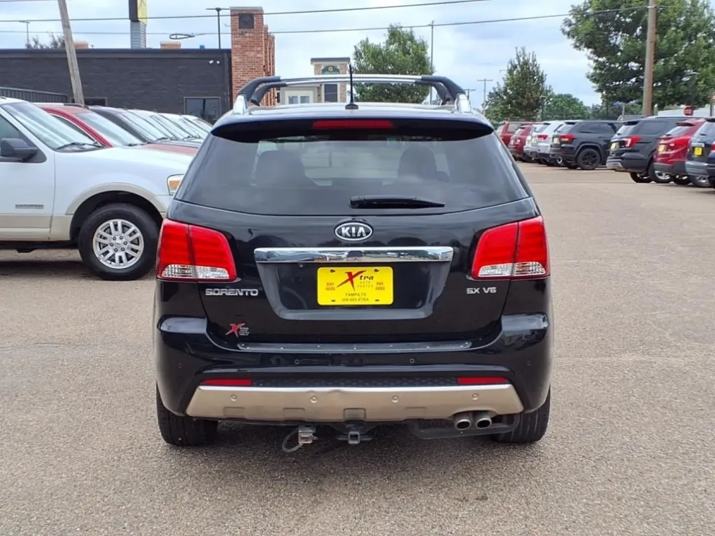 2013 Ebony Black Kia Sorento SX 2WD (5XYKW4A21DG) with an Other engine, located at 1401 N. Hobart, Pampa, TX, 79065, (806) 665-9872, 35.549953, -100.975098 - If you're seeking the perfect vehicle for weekend adventures or family outings, look no further than this 2013 Kia Sorento SX 2WD, available now at Xtra Auto Center in Pampa, TX. This SUV is designed to accommodate all your needs, whether it's a road trip to the stunning Palo Duro Canyon or daily co - Photo#3