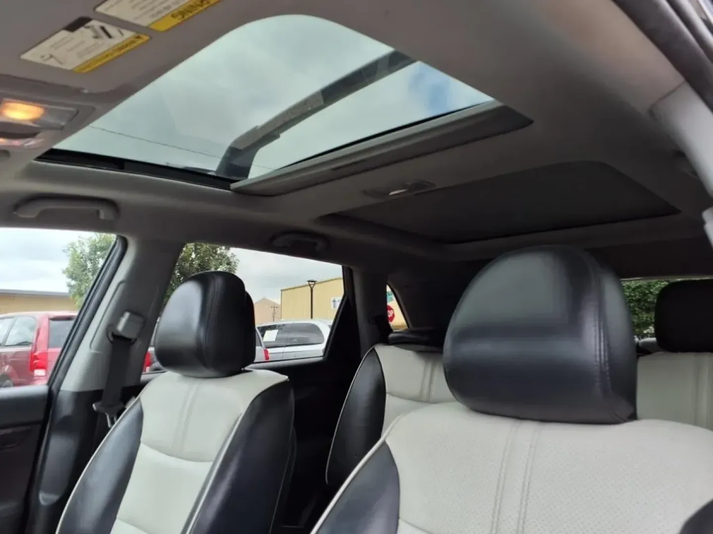 2013 Ebony Black Kia Sorento SX 2WD (5XYKW4A21DG) with an Other engine, located at 1401 N. Hobart, Pampa, TX, 79065, (806) 665-9872, 35.549953, -100.975098 - If you're seeking the perfect vehicle for weekend adventures or family outings, look no further than this 2013 Kia Sorento SX 2WD, available now at Xtra Auto Center in Pampa, TX. This SUV is designed to accommodate all your needs, whether it's a road trip to the stunning Palo Duro Canyon or daily co - Photo#5