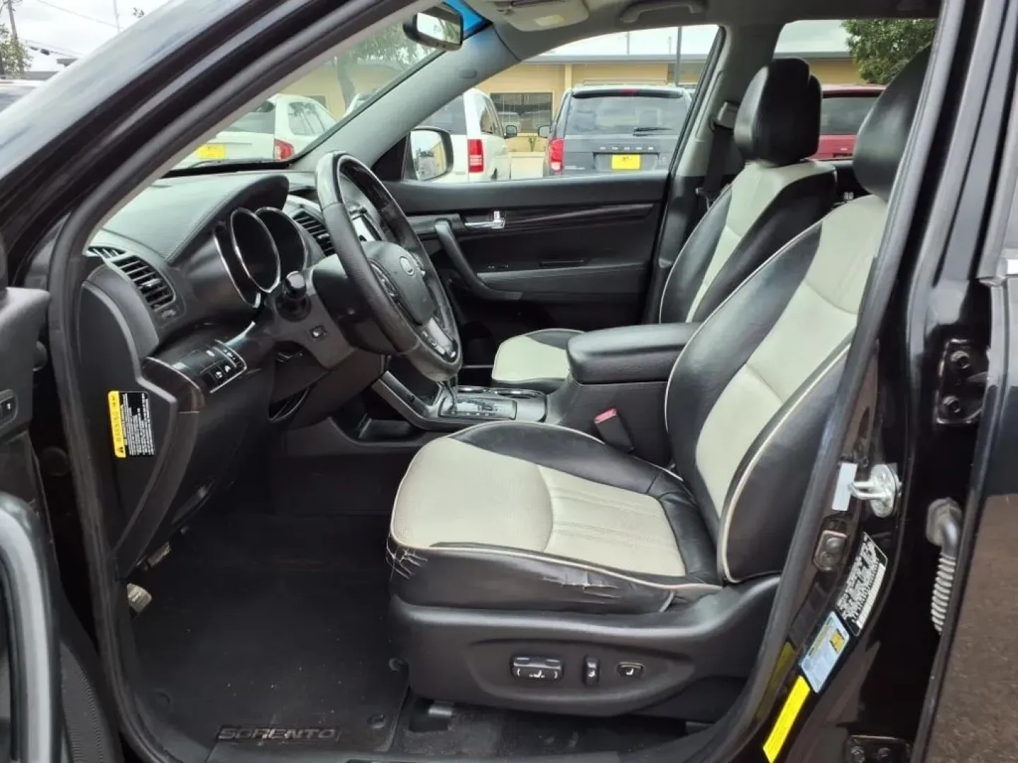 2013 Ebony Black Kia Sorento SX 2WD (5XYKW4A21DG) with an Other engine, located at 1401 N. Hobart, Pampa, TX, 79065, (806) 665-9872, 35.549953, -100.975098 - If you're seeking the perfect vehicle for weekend adventures or family outings, look no further than this 2013 Kia Sorento SX 2WD, available now at Xtra Auto Center in Pampa, TX. This SUV is designed to accommodate all your needs, whether it's a road trip to the stunning Palo Duro Canyon or daily co - Photo#12