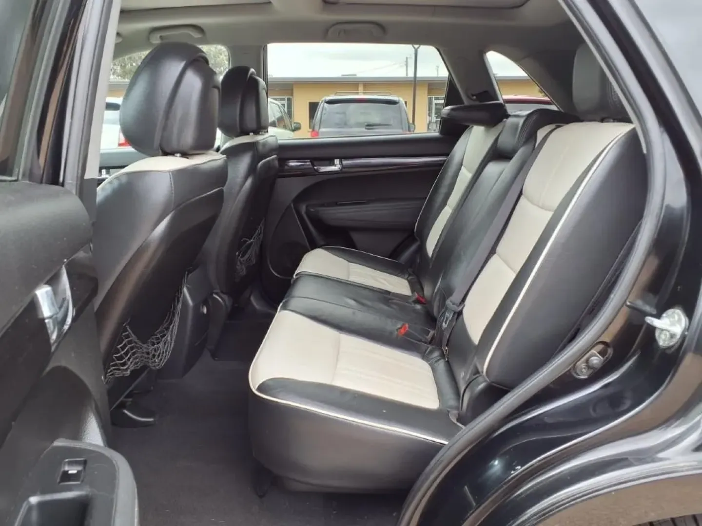 2013 Ebony Black Kia Sorento SX 2WD (5XYKW4A21DG) with an Other engine, located at 1401 N. Hobart, Pampa, TX, 79065, (806) 665-9872, 35.549953, -100.975098 - If you're seeking the perfect vehicle for weekend adventures or family outings, look no further than this 2013 Kia Sorento SX 2WD, available now at Xtra Auto Center in Pampa, TX. This SUV is designed to accommodate all your needs, whether it's a road trip to the stunning Palo Duro Canyon or daily co - Photo#13