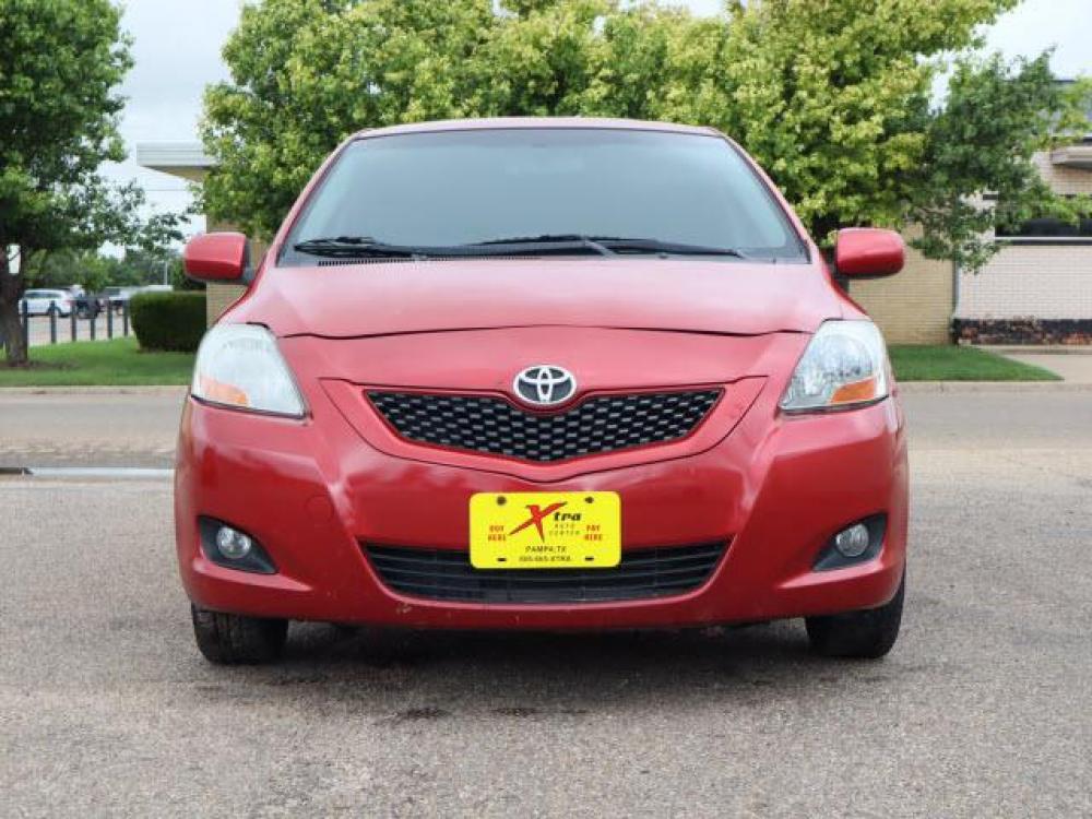 2011 Barcelona Red Metallic Toyota Yaris Base (JTDBT4K34B1) with an 1.5 4 Cylinder Sequential Multiport Fuel Injection engine, Automatic transmission, located at 1401 N. Hobart, Pampa, TX, 79065, (806) 665-9872, 35.549641, -100.971878 - Photo #1