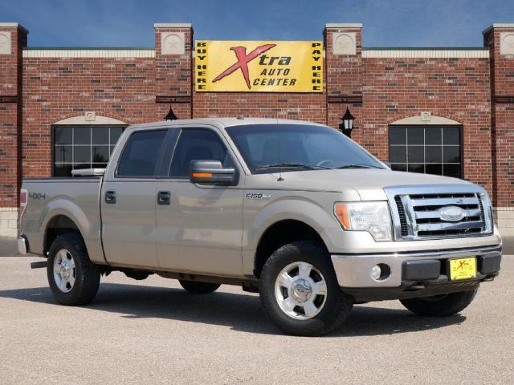 2009 Pueblo Gold Clearcoat Metallic Ford F-150 XLT (1FTPW14V39K) with an 5.4 8 Cylinder Sequential Multiport Fuel Injection engine, Automatic transmission, located at 1401 N. Hobart, Pampa, TX, 79065, (806) 665-9872, 35.549641, -100.971878 - Photo #0