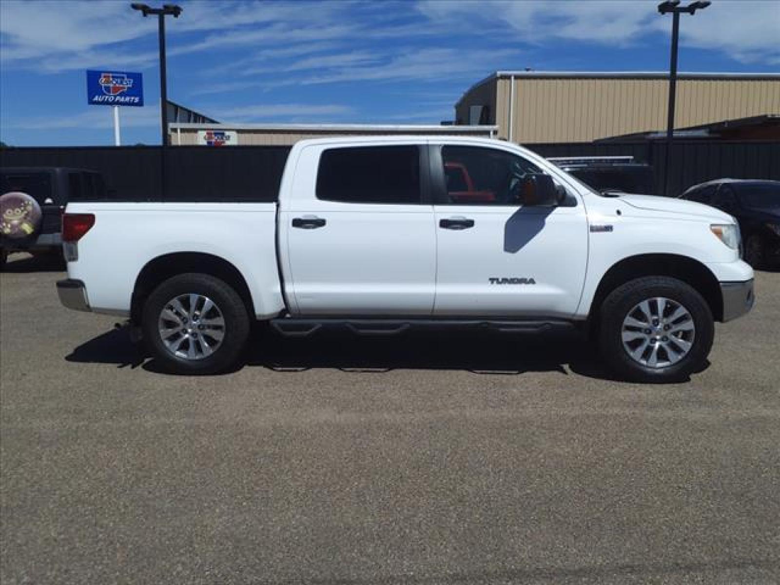 2012 Super White Toyota Tundra Grade (5TFDW5F17CX) with an 5.7L 5.7L Flex Fuel V8 381hp 4 Sequential Multiport Fuel Injection engine, 6-Speed Shiftable Automatic transmission, located at 1401 N. Hobart, Pampa, TX, 79065, (806) 665-9872, 35.549641, -100.971878 - Photo #2