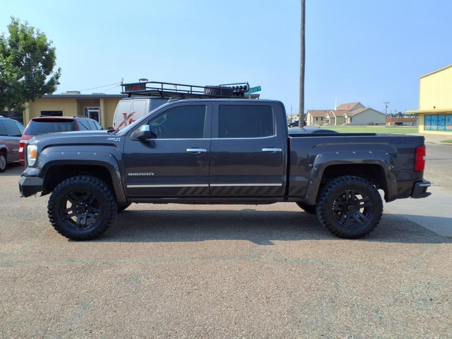 2015 Slate Gray Metallic GMC Sierra 1500 SLT (3GTU2VEJXFG) with an 6.2L EcoTec3 6.2L V8 420hp 460ft. lbs. Direct Injection engine, 8-Speed Shiftable Automatic transmission, located at 1401 N. Hobart, Pampa, TX, 79065, (806) 665-9872, 35.549953, -100.975098 - Photo#4