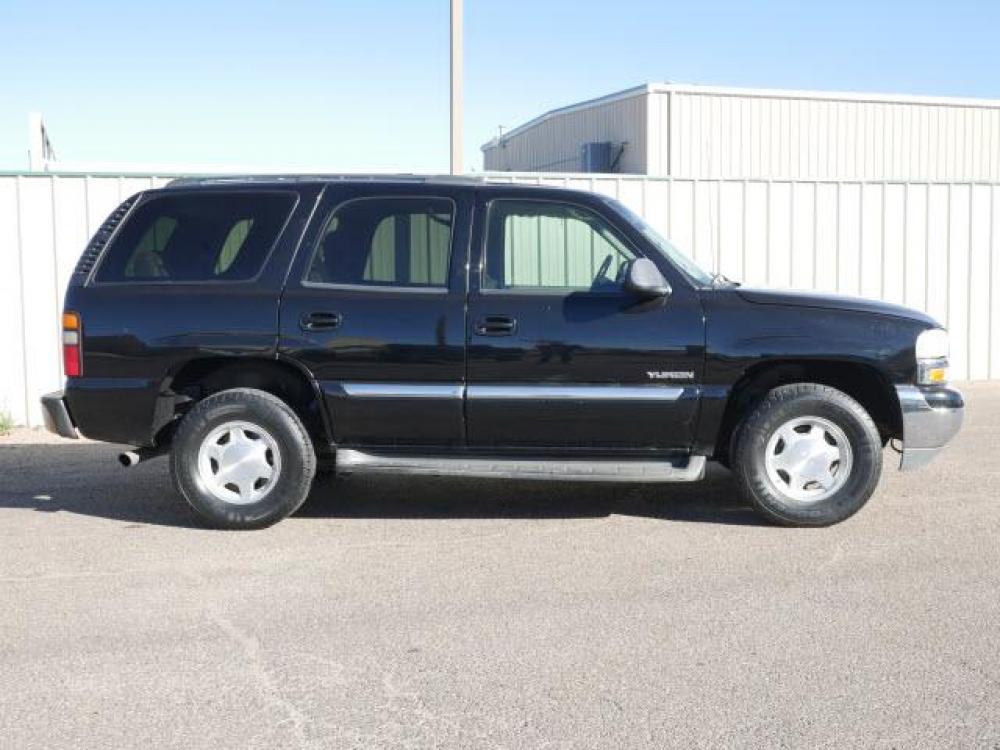2004 Onyx Black GMC Yukon SLT (1GKEC13Z94R) with an 5.3 8 Cylinder Fuel Injected engine, Automatic transmission, located at 1401 N. Hobart, Pampa, TX, 79065, (806) 665-9872, 35.549641, -100.971878 - Photo #2