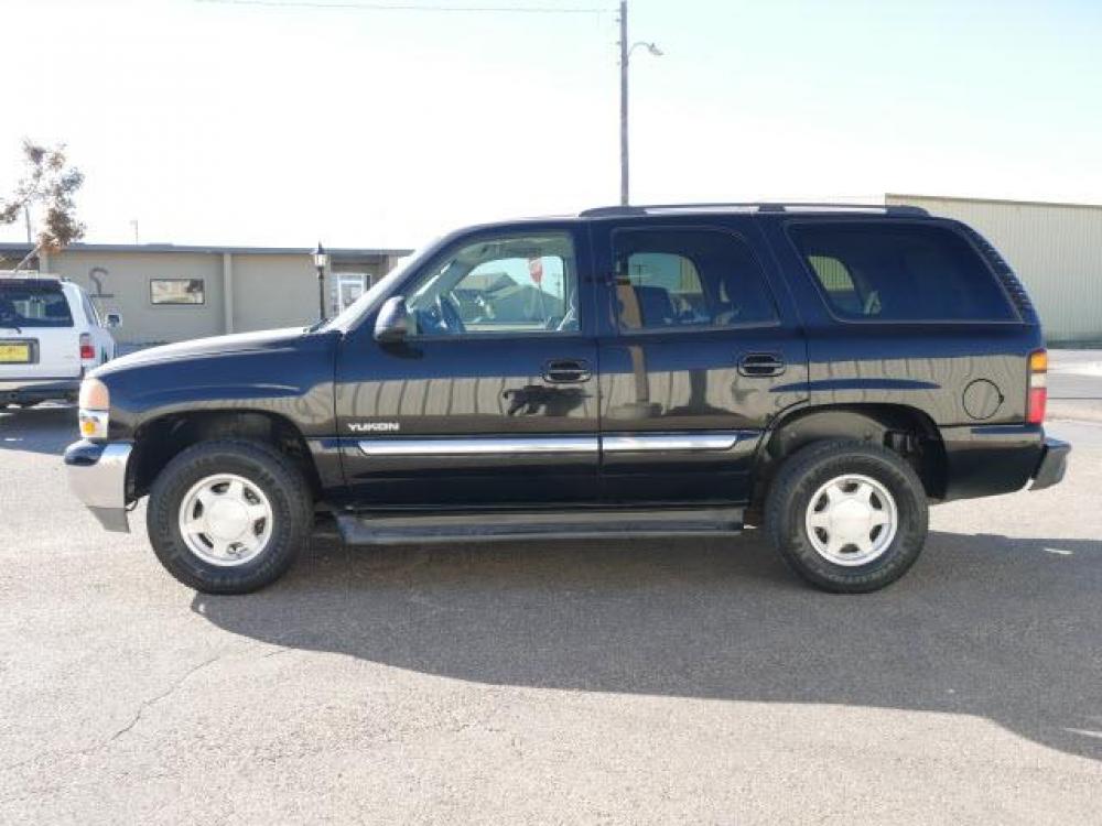 2004 Onyx Black GMC Yukon SLT (1GKEC13Z94R) with an 5.3 8 Cylinder Fuel Injected engine, Automatic transmission, located at 1401 N. Hobart, Pampa, TX, 79065, (806) 665-9872, 35.549641, -100.971878 - Photo #5