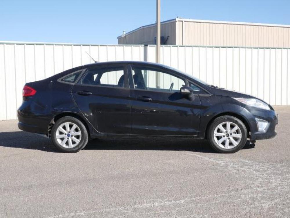 2011 Tuxedo Black Ford Fiesta SEL (3FADP4CJ5BM) with an 1.6 4 Cylinder Sequential Multiport Fuel Injection engine, Automatic transmission, located at 1401 N. Hobart, Pampa, TX, 79065, (806) 665-9872, 35.549641, -100.971878 - Photo #2