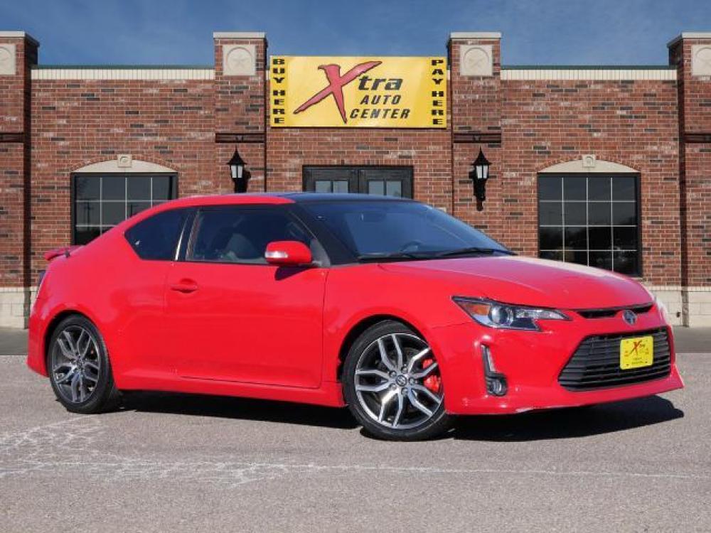 2015 Absolutely Red Scion tC (JTKJF5C71F3) with an 2.5 4 Cylinder Sequential Multiport Fuel Injection engine, 6-Speed Manual transmission, located at 1401 N. Hobart, Pampa, TX, 79065, (806) 665-9872, 35.549641, -100.971878 - Photo #0