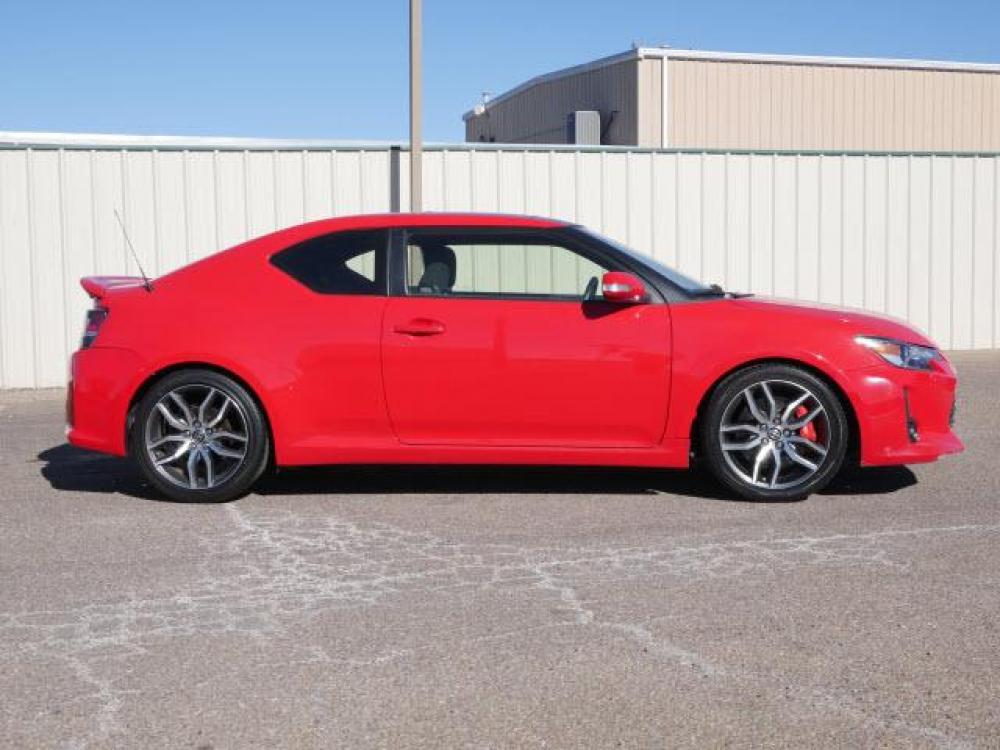 2015 Absolutely Red Scion tC (JTKJF5C71F3) with an 2.5 4 Cylinder Sequential Multiport Fuel Injection engine, 6-Speed Manual transmission, located at 1401 N. Hobart, Pampa, TX, 79065, (806) 665-9872, 35.549641, -100.971878 - Photo #2