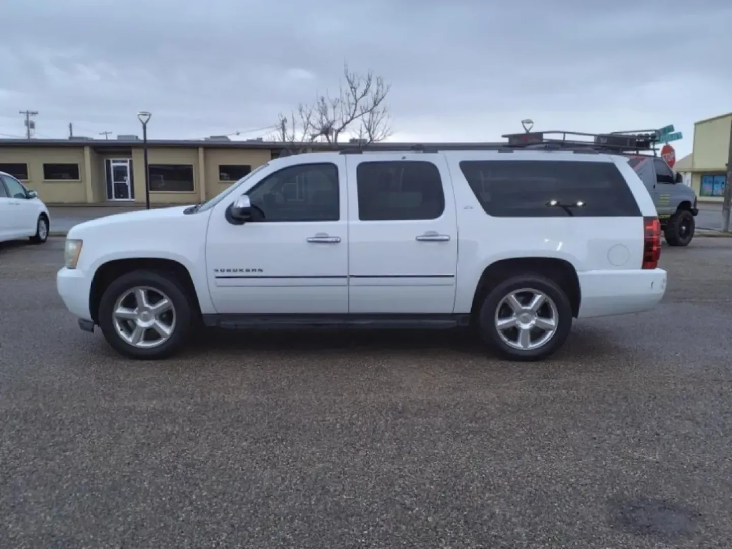 2011 Summit White Chevrolet Suburban LTZ 1500 2WD (1GNSCKE0XBR) with an Other engine, Automatic transmission, located at 1401 N. Hobart, Pampa, TX, 79065, (806) 665-9872, 35.549953, -100.975098 - **Unleash Adventure in the 2011 Chevrolet Suburban LTZ Perfect for Family Journeys!**<br /> <br /> Are you ready to elevate your family outings or weekend adventures? Look no further than the 2011 Chevrolet Suburban LTZ, a spacious and robust SUV that seamlessly fits into your lifestyle, whether yo - Photo#4