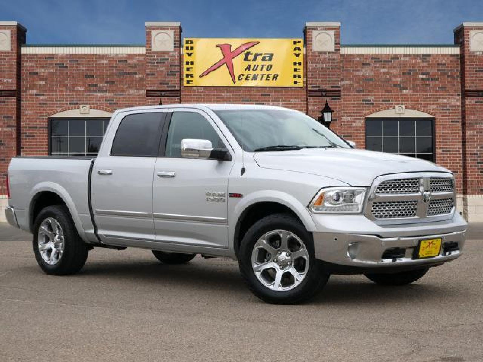 2015 Bright Silver Metallic Clear Coat RAM 1500 Laramie (1C6RR7NM2FS) with an 3.0 6 Cylinder Common Rail Direct Injection engine, Automatic transmission, located at 1401 N. Hobart, Pampa, TX, 79065, (806) 665-9872, 35.549641, -100.971878 - Photo #0