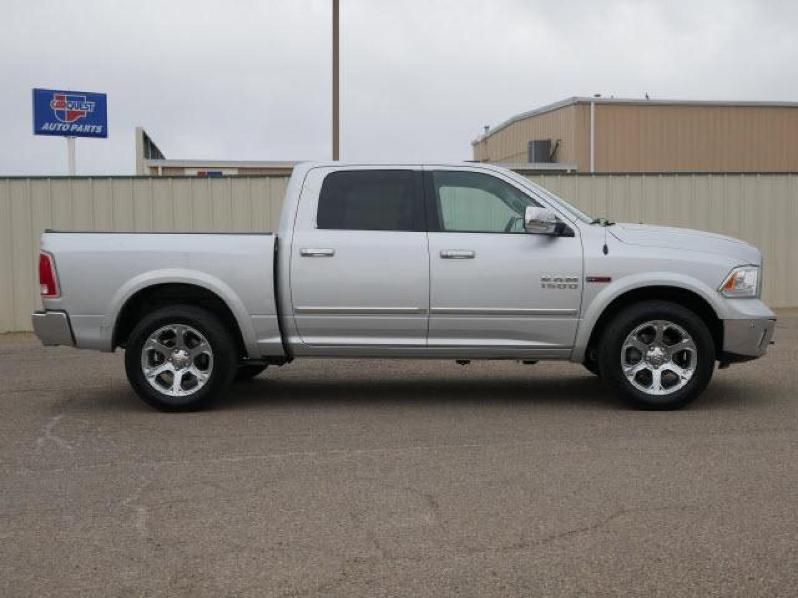 2015 Bright Silver Metallic Clear Coat RAM 1500 Laramie (1C6RR7NM2FS) with an 3.0 6 Cylinder Common Rail Direct Injection engine, Automatic transmission, located at 1401 N. Hobart, Pampa, TX, 79065, (806) 665-9872, 35.549641, -100.971878 - Photo #2