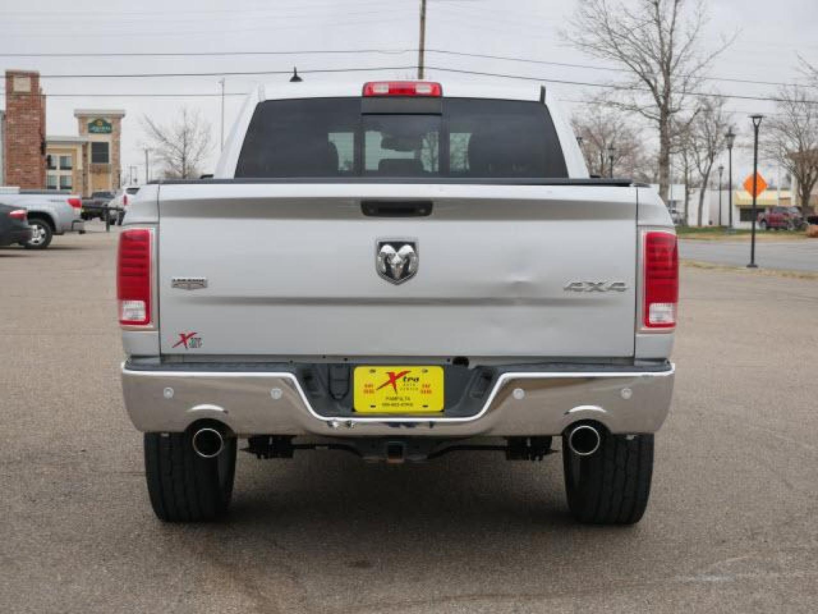 2015 Bright Silver Metallic Clear Coat RAM 1500 Laramie (1C6RR7NM2FS) with an 3.0 6 Cylinder Common Rail Direct Injection engine, Automatic transmission, located at 1401 N. Hobart, Pampa, TX, 79065, (806) 665-9872, 35.549641, -100.971878 - Photo #3