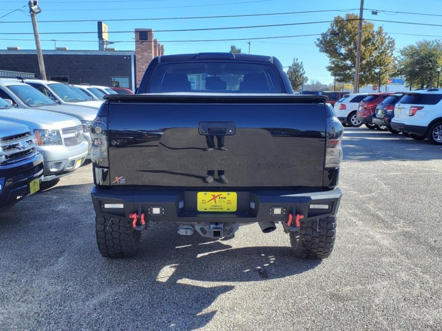 2012 Black 202 Toyota Tundra Grade (5TFDW5F19CX) with an 5.7L 5.7L Flex Fuel V8 381hp 401ft. lbs. Sequential Multiport Fuel Injection engine, 6-Speed Shiftable Automatic transmission, located at 1401 N. Hobart, Pampa, TX, 79065, (806) 665-9872, 35.549953, -100.975098 - Photo#3