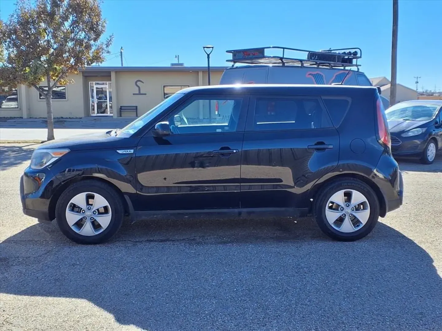 2015 Shadow Black Kia SOUL (KNDJN2A24F7) with an 1.6L engine, Automatic transmission, located at 1401 N. Hobart, Pampa, TX, 79065, (806) 665-9872, 35.549953, -100.975098 - Are you searching for a versatile vehicle that fits your active lifestyle while being budget-friendly? Look no further! At Xtra Auto Center in Pampa, TX, we proudly present a 2015 Kia Soul that's perfect for everything from daily commutes to weekend adventures. With its spacious interior and impress - Photo#4