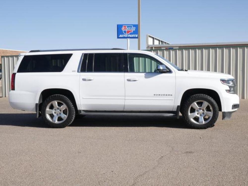 2015 Summit White Chevrolet Suburban LTZ 1500 (1GNSKKKC2FR) with an 5.3 8 Cylinder Direct Injection engine, Automatic transmission, located at 1401 N. Hobart, Pampa, TX, 79065, (806) 665-9872, 35.549641, -100.971878 - Photo #2