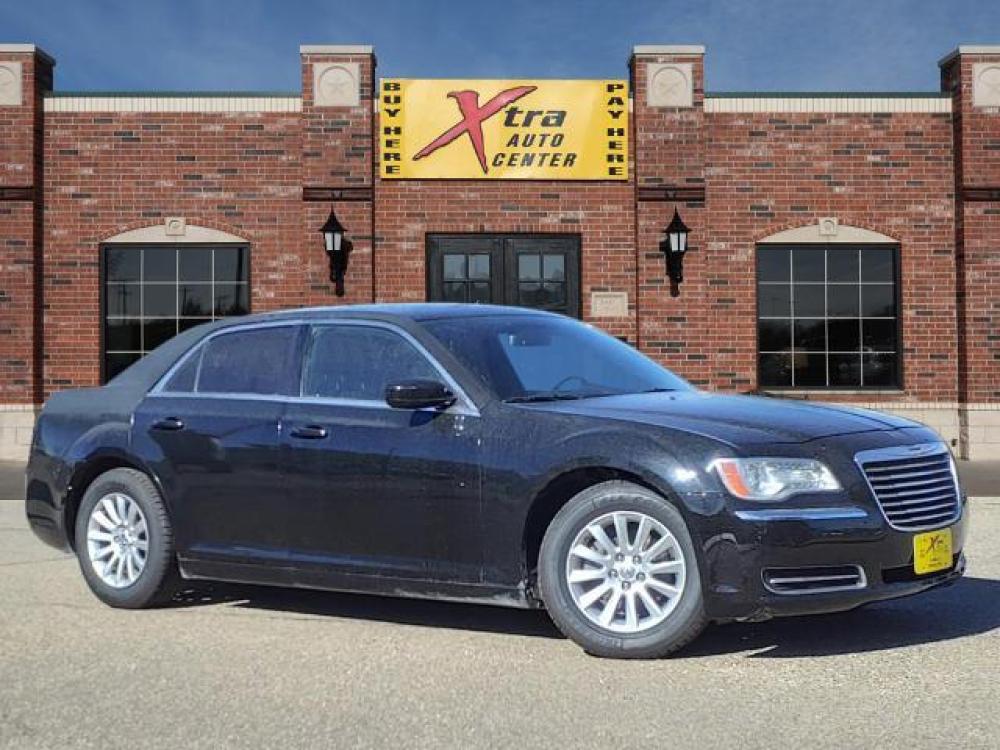 2013 Gloss Black Chrysler 300 Base (2C3CCAAG1DH) with an 3.6 6 Cylinder Sequential Multiport Fuel Injection engine, Automatic transmission, located at 1401 N. Hobart, Pampa, TX, 79065, (806) 665-9872, 35.549641, -100.971878 - Photo #0
