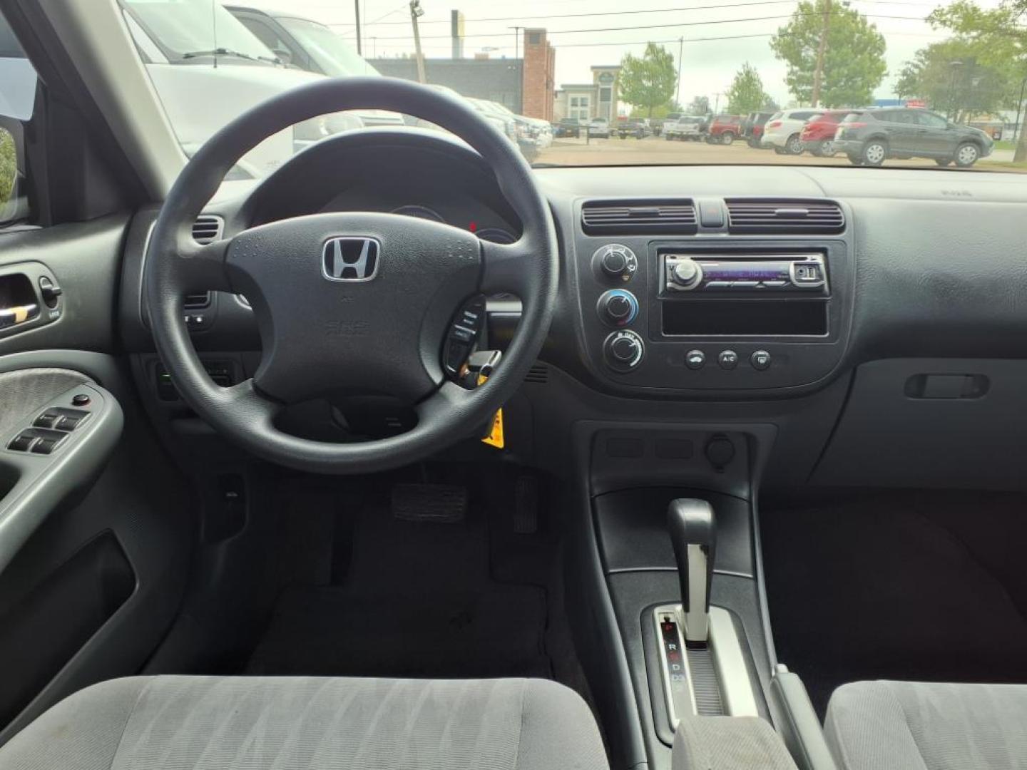 2004 Nighthawk Black Pearl Bk Honda Civic EX (JHMES26744S) with an 1.7L 1L NA I4 single overhead cam (SOHC) 16V Fuel Injected engine, 4-Speed Automatic transmission, located at 1401 N. Hobart, Pampa, TX, 79065, (806) 665-9872, 35.549953, -100.975098 - Photo#9