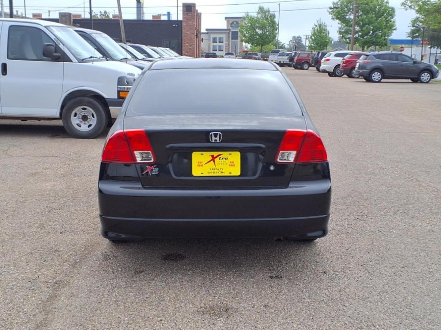 2004 Nighthawk Black Pearl Bk Honda Civic EX (JHMES26744S) with an 1.7L 1L NA I4 single overhead cam (SOHC) 16V Fuel Injected engine, 4-Speed Automatic transmission, located at 1401 N. Hobart, Pampa, TX, 79065, (806) 665-9872, 35.549953, -100.975098 - Photo#3