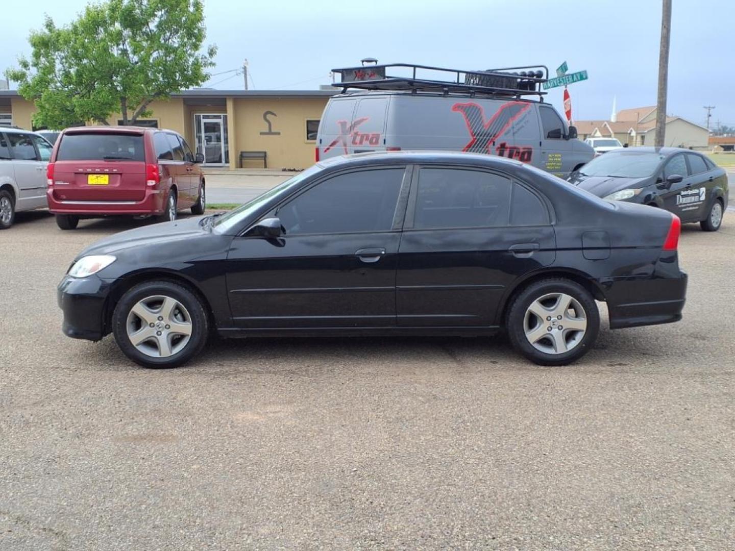 2004 Nighthawk Black Pearl Bk Honda Civic EX (JHMES26744S) with an 1.7L 1L NA I4 single overhead cam (SOHC) 16V Fuel Injected engine, 4-Speed Automatic transmission, located at 1401 N. Hobart, Pampa, TX, 79065, (806) 665-9872, 35.549953, -100.975098 - Photo#4