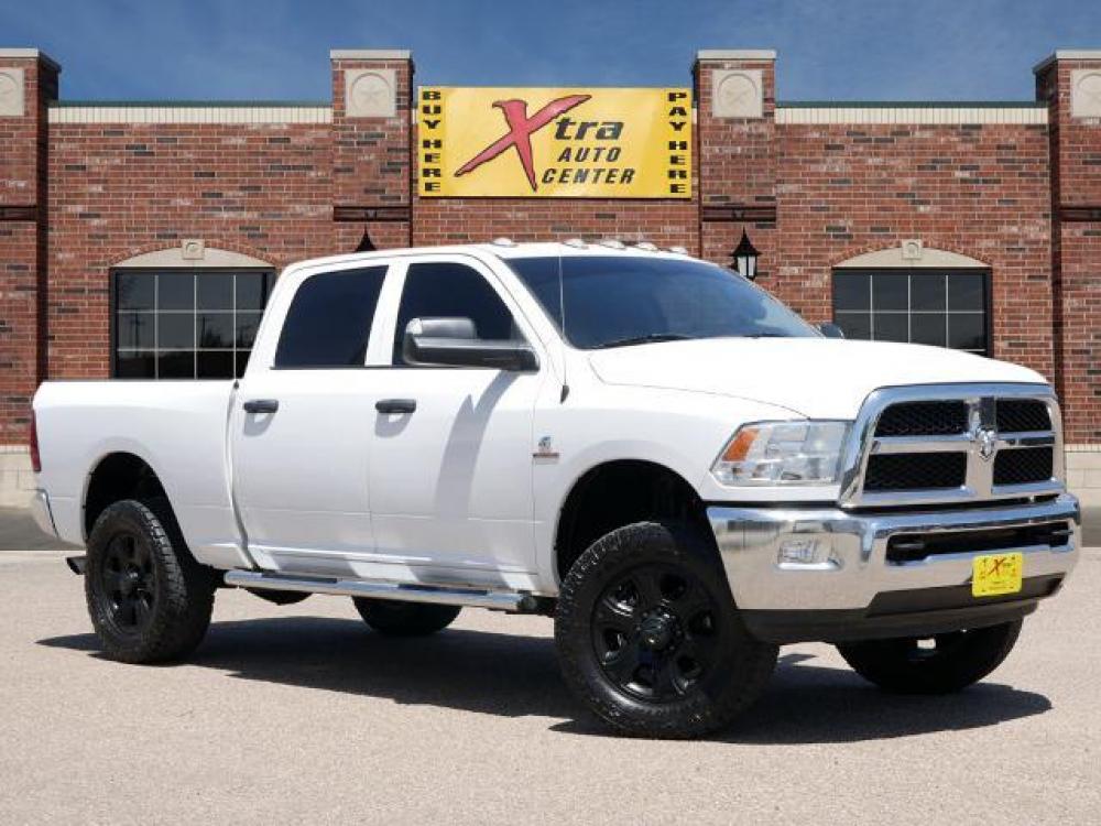 2018 Bright White Clear Coat RAM 2500 Tradesman (3C6UR5CL0JG) with an 6.7 6 Cylinder Common Rail Direct Injection engine, Automatic transmission, located at 1401 N. Hobart, Pampa, TX, 79065, (806) 665-9872, 35.549641, -100.971878 - Photo #0