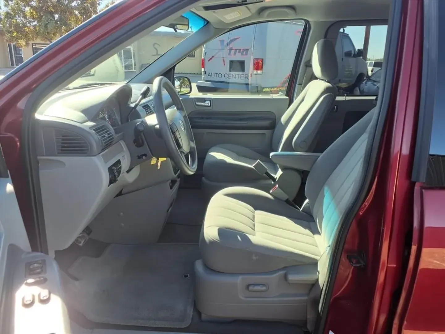 2004 Matador Red Clearcoat Metallic Mercury Monterey Convenience (2MRZA20254B) with an Other engine, located at 1401 N. Hobart, Pampa, TX, 79065, (806) 665-9872, 35.549953, -100.975098 - **Discover Adventure and Family Comfort with the 2004 Mercury Monterey at Xtra Auto Center!**<br /> <br /> Are you in search of a reliable vehicle that perfectly accommodates family road trips and weekend getaways? Look no further than this stunning 2004 Mercury Monterey! With a spacious interior, c - Photo#9