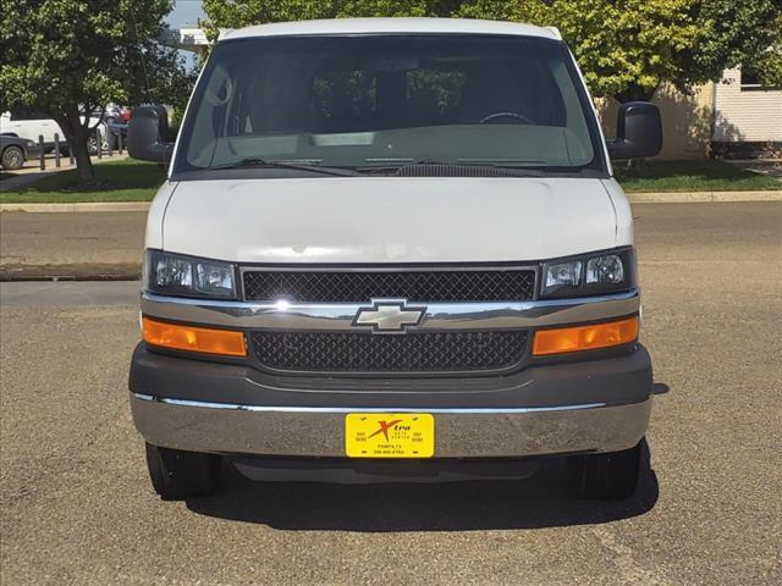 2012 Summit White Chevrolet Express Passenger LT 3500 (1GAZG1FG9C1) with an 6.0L 4.8L Flex Fuel V8 280hp 2 Sequential-Port F.I. engine, 6-Speed Shiftable Automatic transmission, located at 1401 N. Hobart, Pampa, TX, 79065, (806) 665-9872, 35.549953, -100.975098 - Photo #1