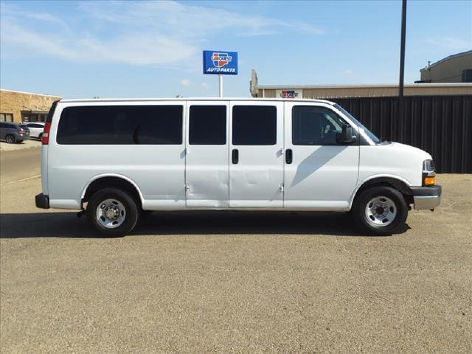 2012 Summit White Chevrolet Express Passenger LT 3500 (1GAZG1FG9C1) with an 6.0L 4.8L Flex Fuel V8 280hp 2 Sequential-Port F.I. engine, 6-Speed Shiftable Automatic transmission, located at 1401 N. Hobart, Pampa, TX, 79065, (806) 665-9872, 35.549641, -100.971878 - Photo #2