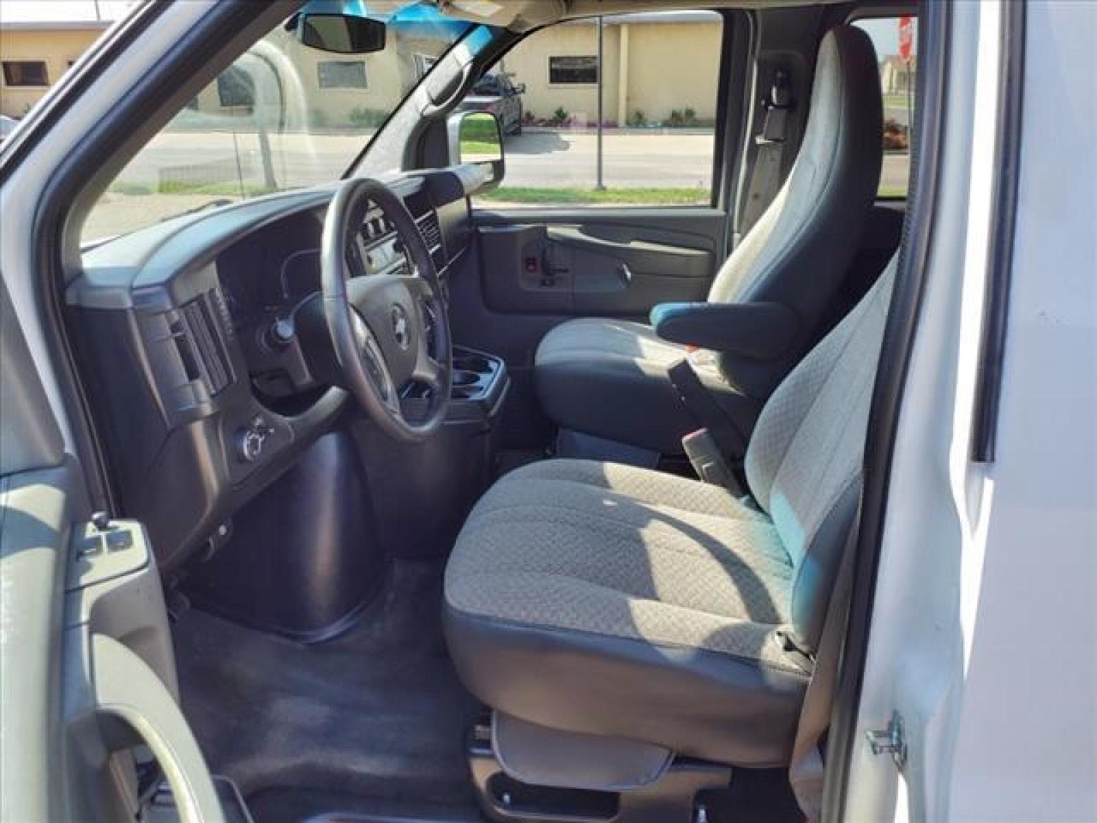 2012 Summit White Chevrolet Express Passenger LT 3500 (1GAZG1FG9C1) with an 6.0L 4.8L Flex Fuel V8 280hp 2 Sequential-Port F.I. engine, 6-Speed Shiftable Automatic transmission, located at 1401 N. Hobart, Pampa, TX, 79065, (806) 665-9872, 35.549953, -100.975098 - Photo #8