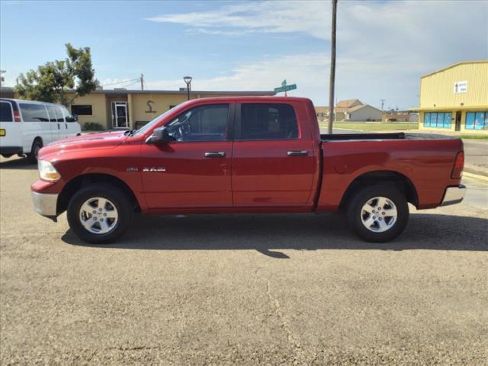 2009 Inferno Red Crystal Pearl Coat Dodge Ram Pickup 1500 SLT (1D3HV13T79S) with an 5.7L HEMI 5.7L V8 390hp 407ft. Sequential Multiport Fuel Injection engine, 5-Speed Automatic transmission, located at 1401 N. Hobart, Pampa, TX, 79065, (806) 665-9872, 35.549641, -100.971878 - Photo #4