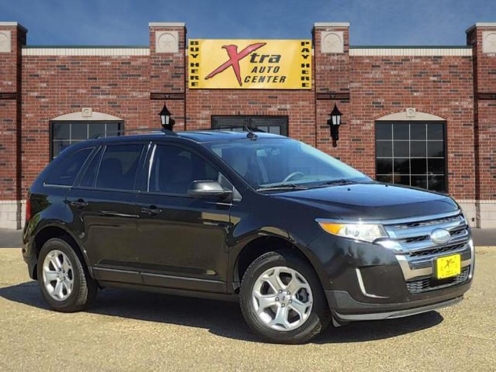 2013 Tuxedo Black Metallic Ford Edge SEL (2FMDK3JC1DB) with an 3.5L 3.5L V6 285hp 253ft. lbs. Sequential Multiport Fuel Injection engine, 6-Speed Shiftable Automatic transmission, located at 1401 N. Hobart, Pampa, TX, 79065, (806) 665-9872, 35.549641, -100.971878 - Photo #0