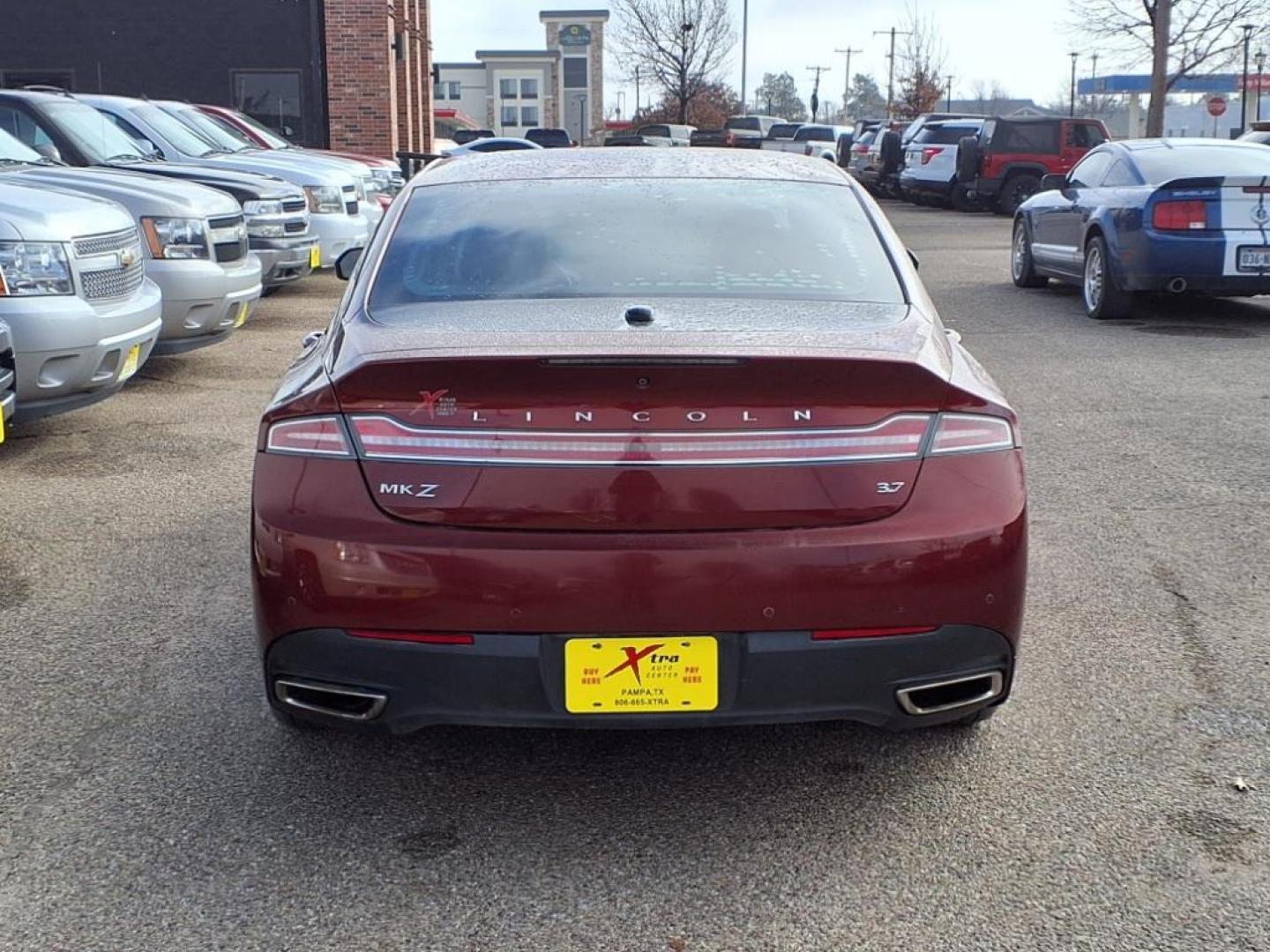 2014 Sunset Metallic D7 Lincoln MKZ Base (3LN6L2GK5ER) with an 3.7L 3.7L V6 300hp 277ft. lbs. Sequential Multiport Fuel Injection engine, 6-Speed Shiftable Automatic transmission, located at 1401 N. Hobart, Pampa, TX, 79065, (806) 665-9872, 35.549953, -100.975098 - Photo#3