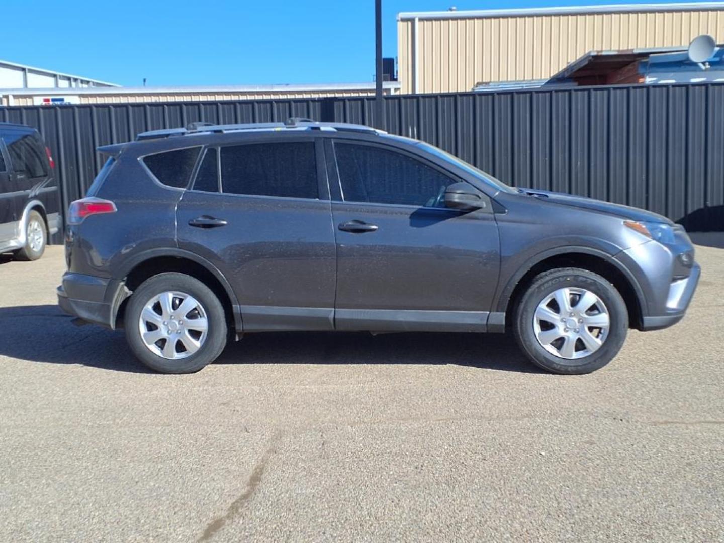 2016 Gray Toyota RAV4 LE (JTMZFREV4GJ) with an 2.5L 4 Cylinder Fuel Injected engine, Automatic transmission, located at 1401 N. Hobart, Pampa, TX, 79065, (806) 665-9872, 35.549953, -100.975098 - Photo#2