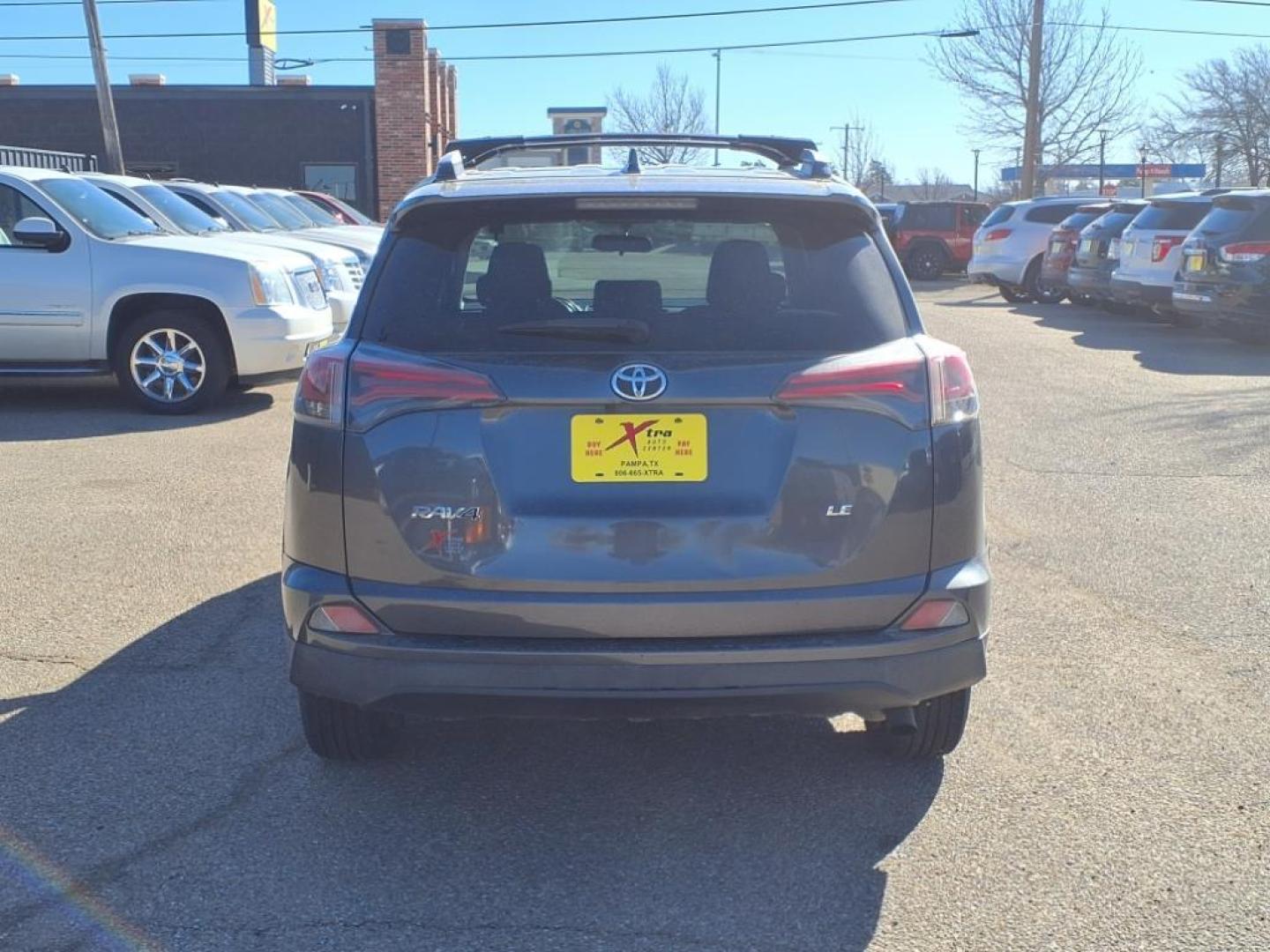2016 Gray Toyota RAV4 LE (JTMZFREV4GJ) with an 2.5L 4 Cylinder Fuel Injected engine, Automatic transmission, located at 1401 N. Hobart, Pampa, TX, 79065, (806) 665-9872, 35.549953, -100.975098 - Photo#3