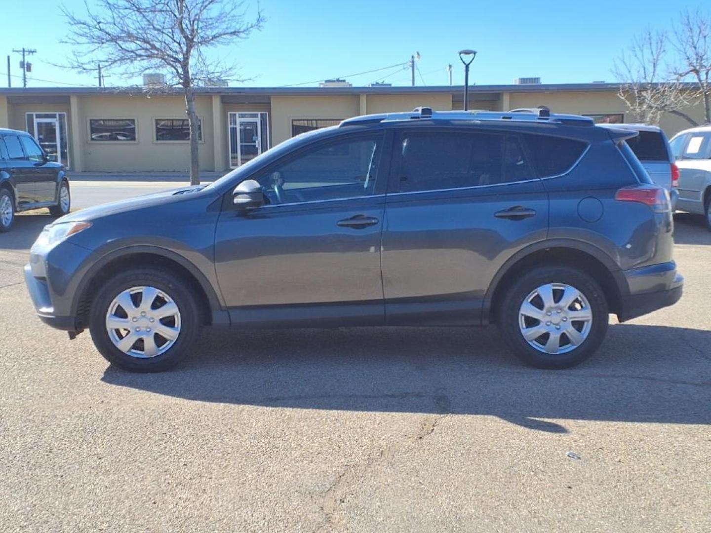 2016 Gray Toyota RAV4 LE (JTMZFREV4GJ) with an 2.5L 4 Cylinder Fuel Injected engine, Automatic transmission, located at 1401 N. Hobart, Pampa, TX, 79065, (806) 665-9872, 35.549953, -100.975098 - Photo#4
