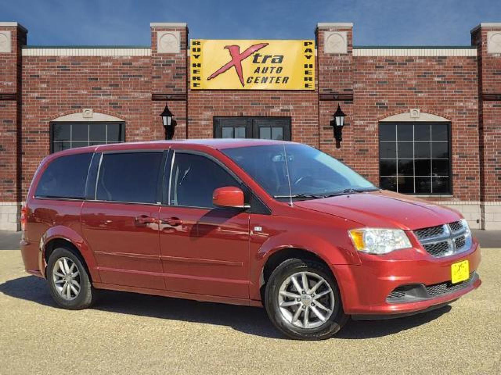2014 Deep Cherry Red Crystal Pearl Coat Dodge Grand Caravan SE 30th Anniversary (2C4RDGBG8ER) with an Pentastar 3.6L Flex Fuel Sequential Multiport Fuel Injection engine, 6-Speed Shiftable Automatic transmission, located at 1401 N. Hobart, Pampa, TX, 79065, (806) 665-9872, 35.549641, -100.971878 - Photo #0