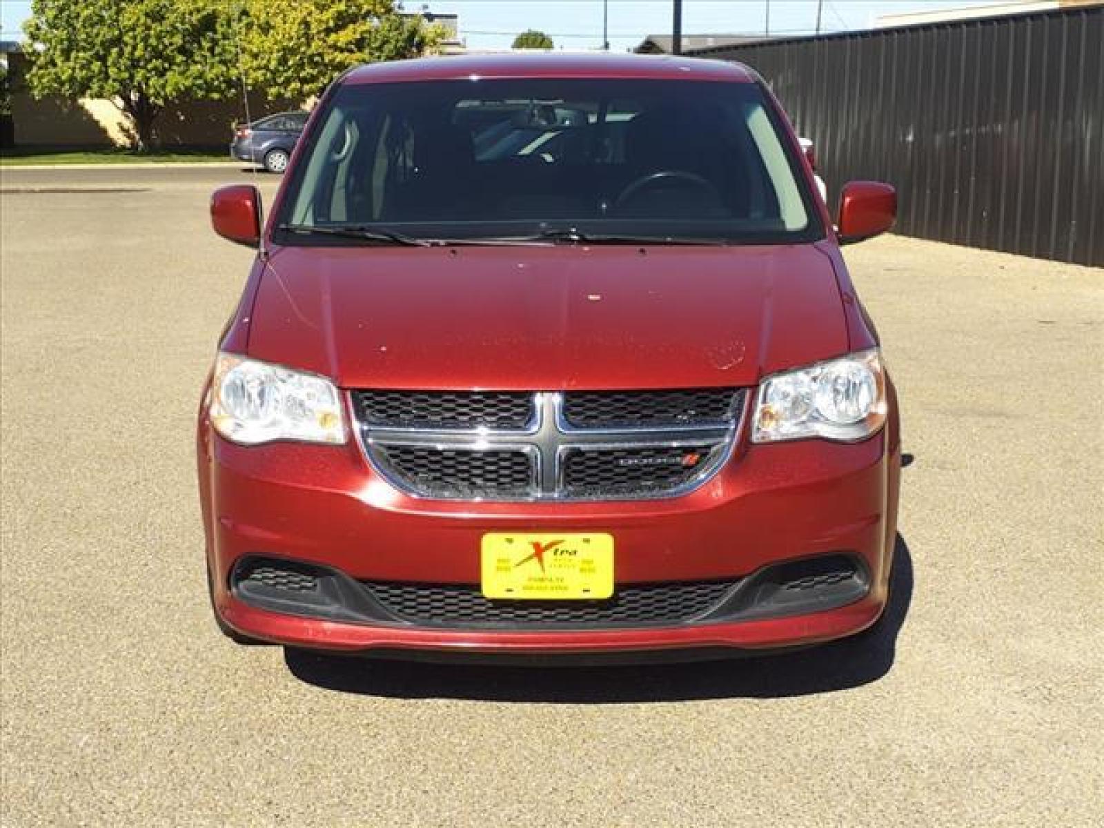 2014 Deep Cherry Red Crystal Pearl Coat Dodge Grand Caravan SE 30th Anniversary (2C4RDGBG8ER) with an Pentastar 3.6L Flex Fuel Sequential Multiport Fuel Injection engine, 6-Speed Shiftable Automatic transmission, located at 1401 N. Hobart, Pampa, TX, 79065, (806) 665-9872, 35.549641, -100.971878 - Photo #1