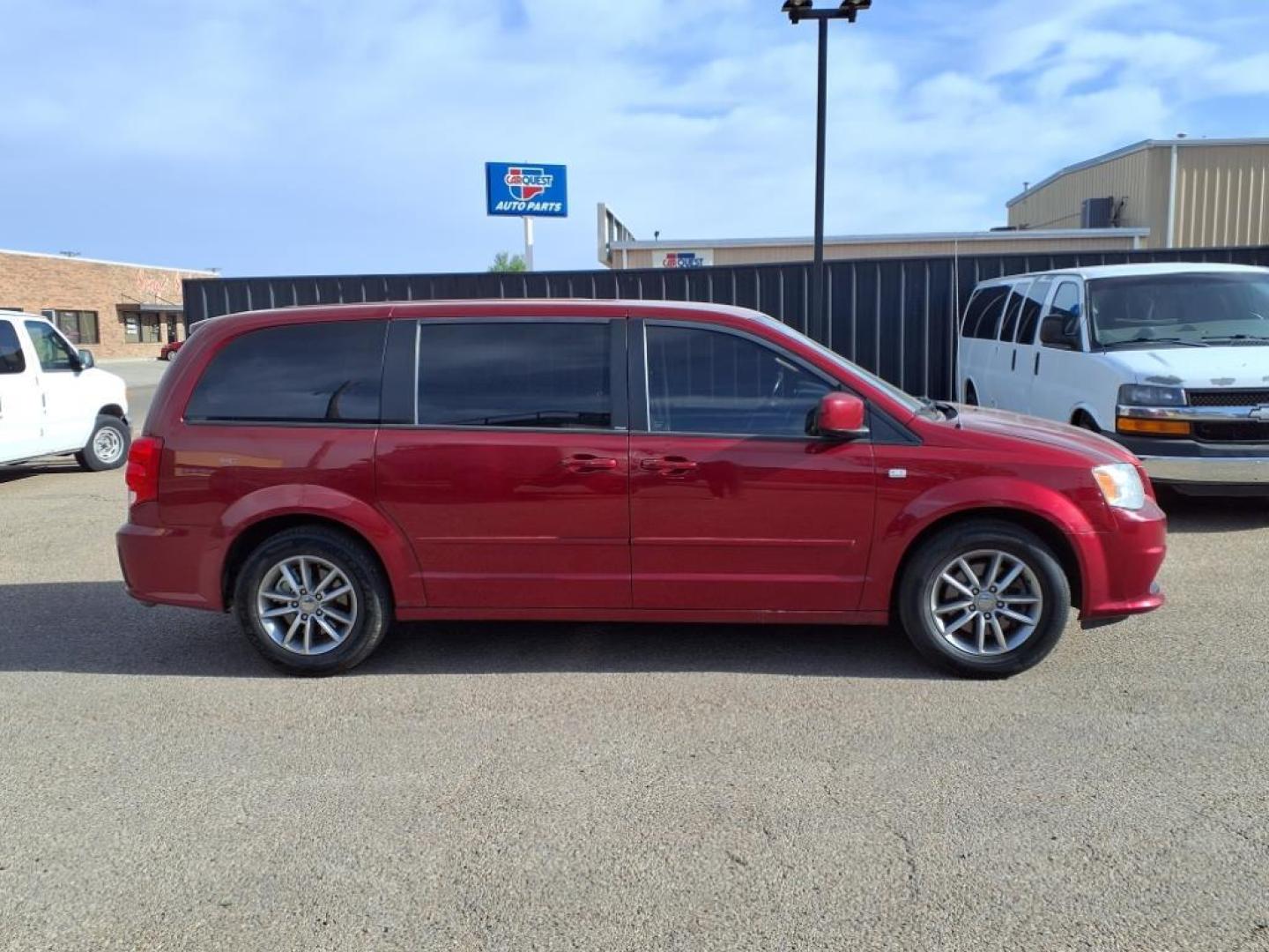 2014 Deep Cherry Red Crystal Pearl Coat Prp Dodge Grand Caravan SE 30th Anniversary (2C4RDGBG8ER) with an 3.6L Pentastar 3.6L Flex Fuel V6 283hp 260ft. lbs. Sequential Multiport Fuel Injection engine, 6-Speed Shiftable Automatic transmission, located at 1401 N. Hobart, Pampa, TX, 79065, (806) 665-9872, 35.549953, -100.975098 - Photo#2