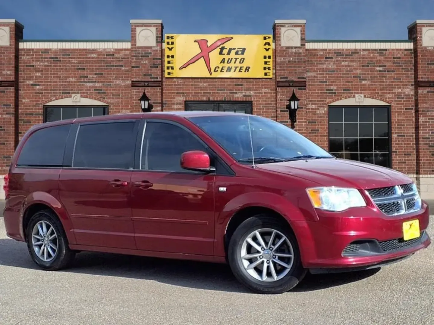 2014 Deep Cherry Red Crystal Pearl Coat Prp Dodge Grand Caravan SE (2C4RDGBG8ER) with an Other engine, located at 1401 N. Hobart, Pampa, TX, 79065, (806) 665-9872, 35.549953, -100.975098 - **Drive Your Family Adventures in the 2014 Dodge Grand Caravan SE!**<br /> <br /> Are you ready to elevate your family adventures? The 2014 Dodge Grand Caravan SE is designed for growing families who need the perfect blend of space, comfort, and reliability. With room for up to seven passengers and - Photo#0