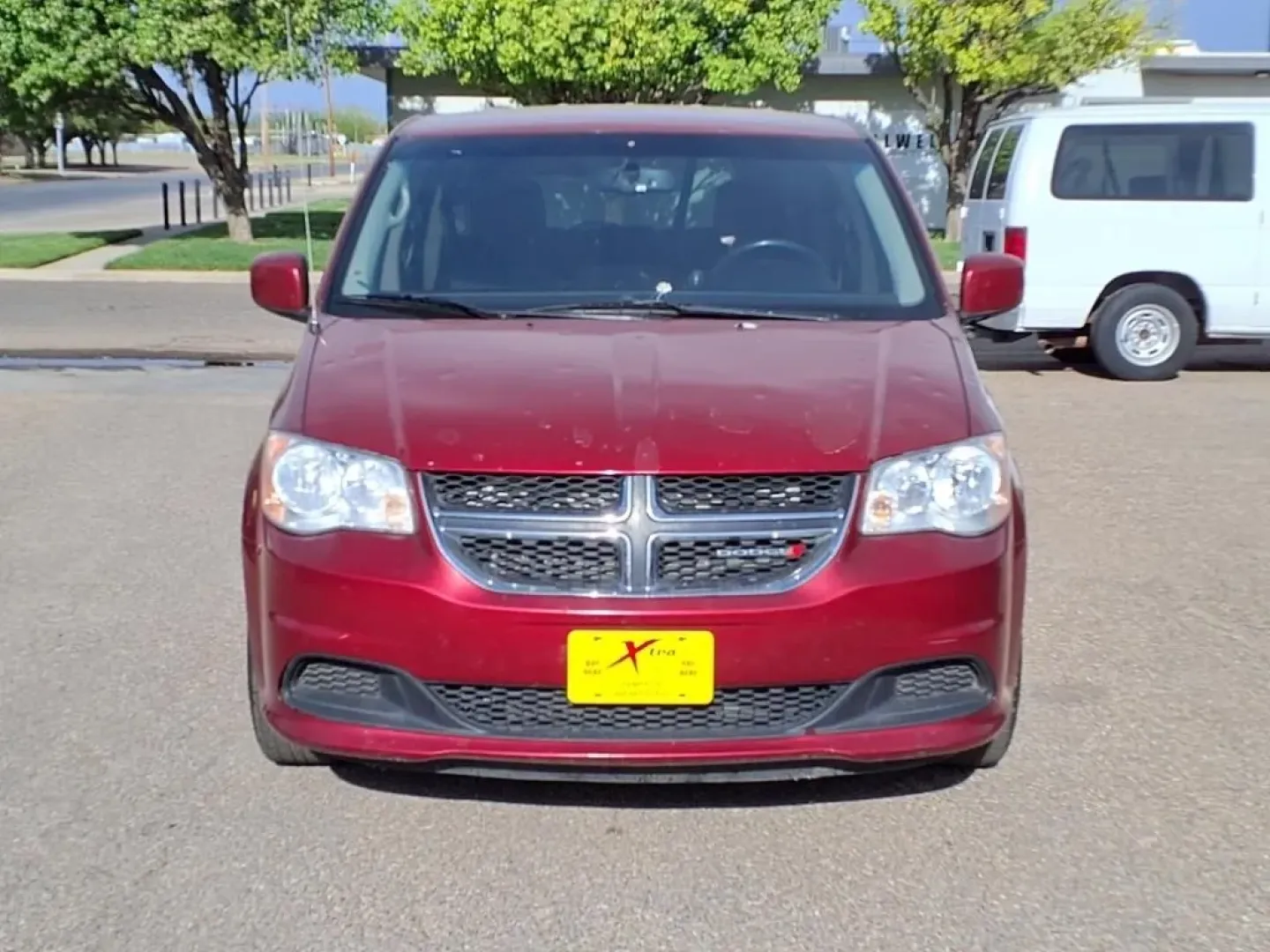 2014 Deep Cherry Red Crystal Pearl Coat Prp Dodge Grand Caravan SE (2C4RDGBG8ER) with an Other engine, located at 1401 N. Hobart, Pampa, TX, 79065, (806) 665-9872, 35.549953, -100.975098 - **Drive Your Family Adventures in the 2014 Dodge Grand Caravan SE!**<br /> <br /> Are you ready to elevate your family adventures? The 2014 Dodge Grand Caravan SE is designed for growing families who need the perfect blend of space, comfort, and reliability. With room for up to seven passengers and - Photo#1