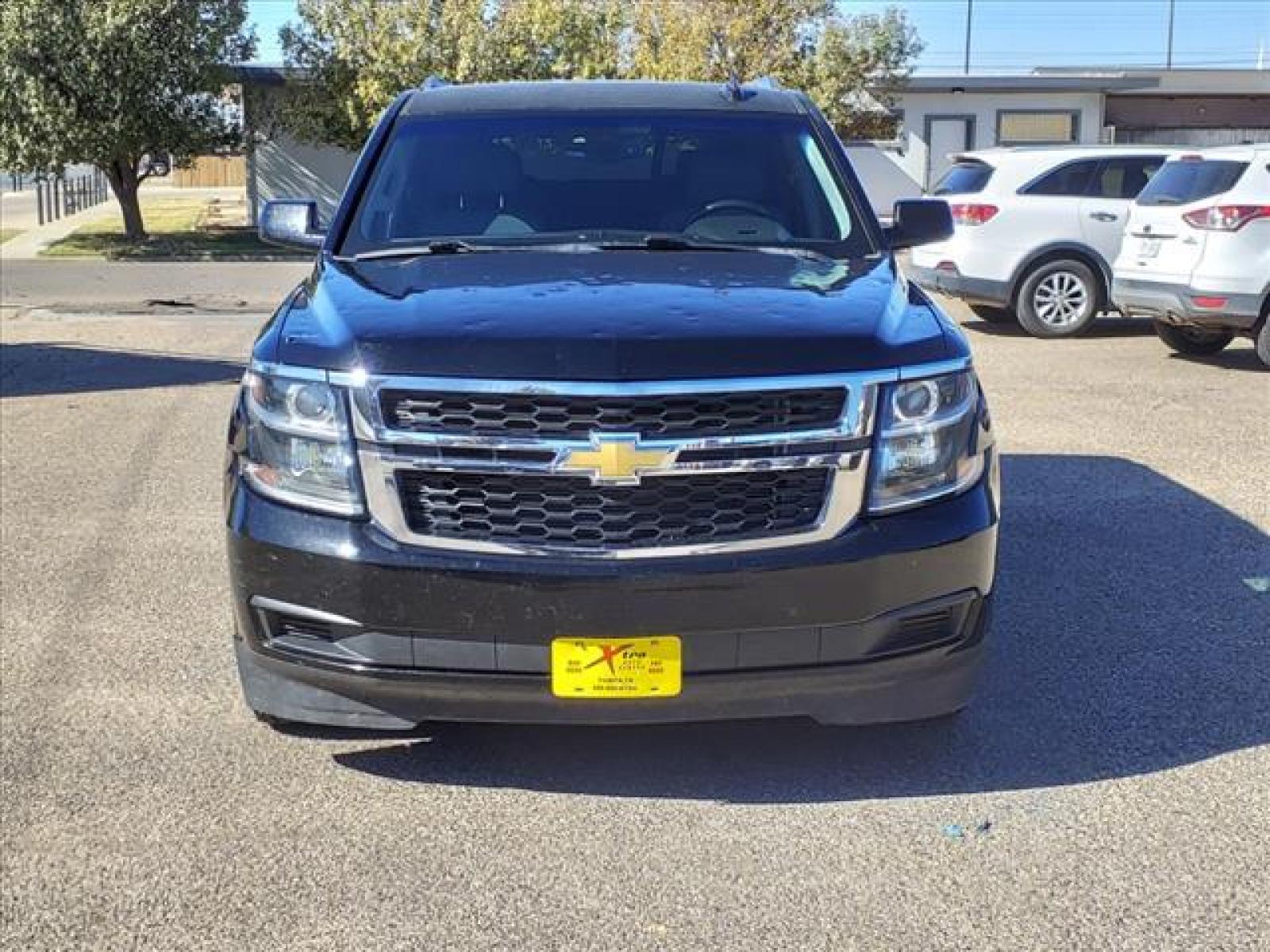 2015 Black Chevrolet Tahoe LT (1GNSCBKC9FR) with an 5.3L EcoTec3 5.3L Flex Fuel V8 Direct Injection engine, 6-Speed Shiftable Automatic w/Overdrive transmission, located at 1401 N. Hobart, Pampa, TX, 79065, (806) 665-9872, 35.549641, -100.971878 - Photo #1