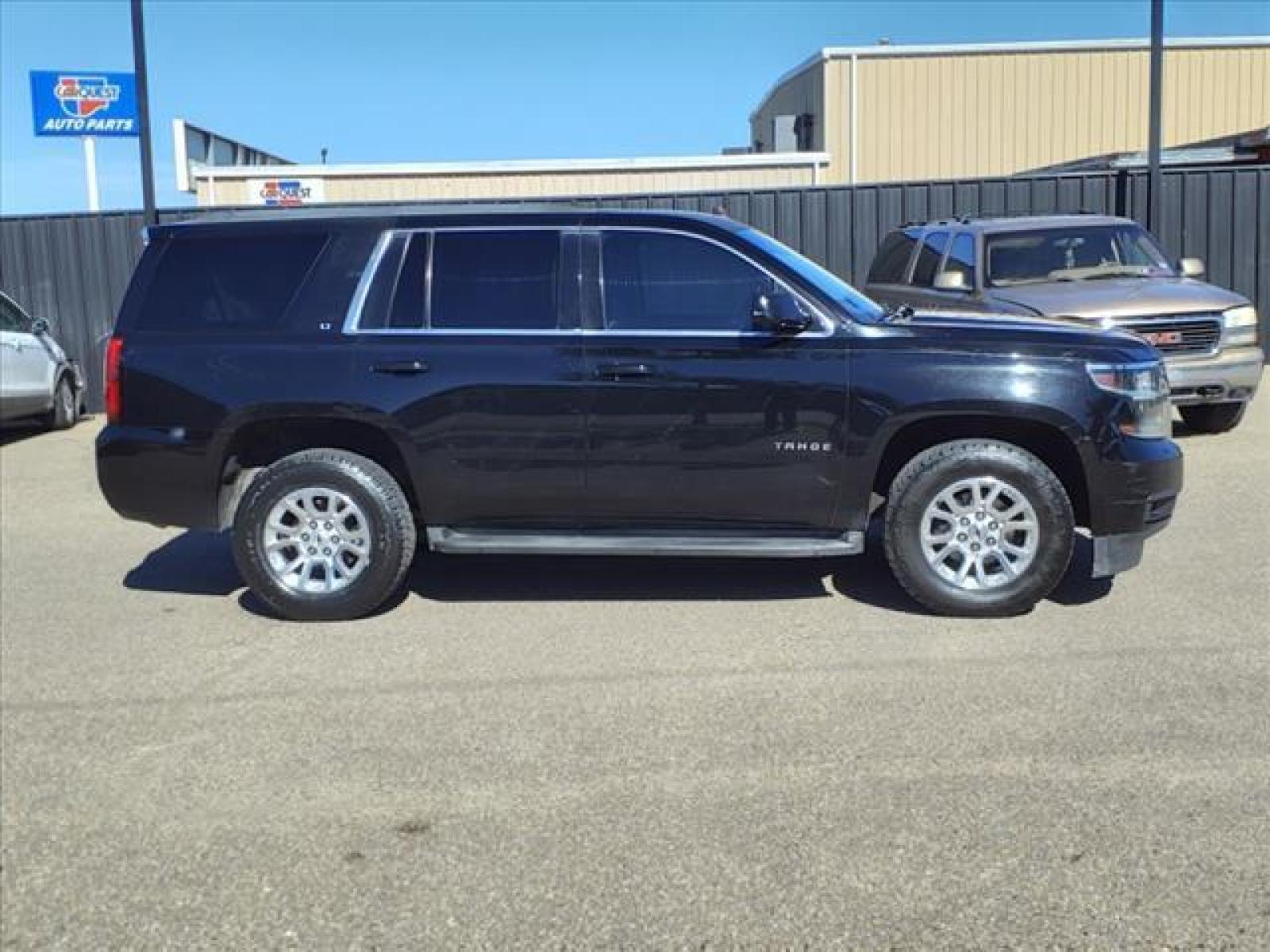 2015 Black Chevrolet Tahoe LT (1GNSCBKC9FR) with an 5.3L EcoTec3 5.3L Flex Fuel V8 Direct Injection engine, 6-Speed Shiftable Automatic w/Overdrive transmission, located at 1401 N. Hobart, Pampa, TX, 79065, (806) 665-9872, 35.549641, -100.971878 - Photo #2